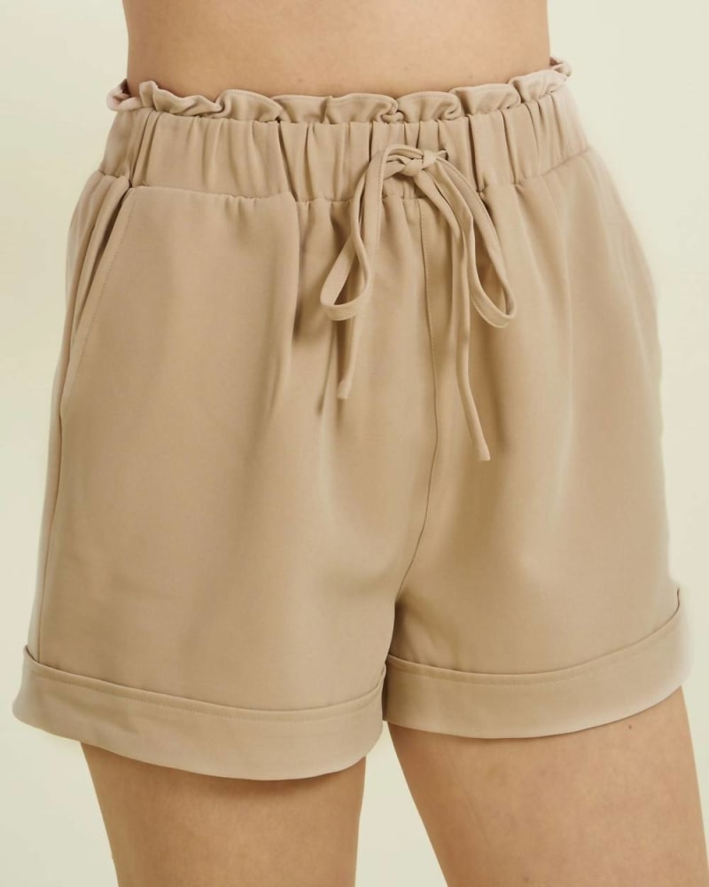 Front of a model wearing a size Large Keep It Neutral Shorts In Tan in Tan by GLAM. | dia_product_style_image_id:360237